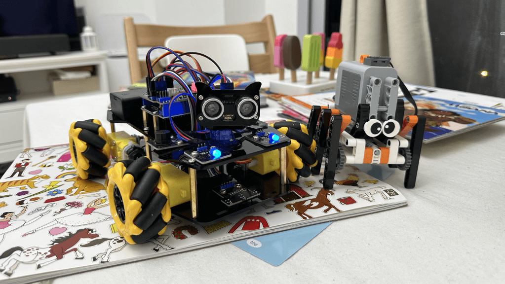 Festive STEM Adventure: Building the Acebott ESP32 QD001 Robot Car with My Daughter